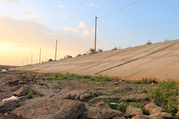Buzuluk, Russia - August 10, 2014: strangers fish in the lake sp