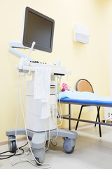 Interior of hospital room with ultrasound machine