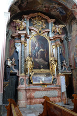 Fototapeta na wymiar Altar of Saint Barbara in Barmherzigenkirche in Graz, Austria
