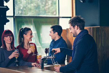 Group Of Friends In Tavern