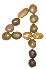 collection of letters of sea stones close-up isolated