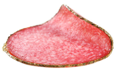 Slice of salami isolated on white background