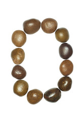 collection of letters of sea stones close-up isolated
