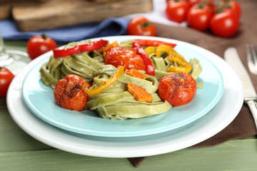 Pasta salad with pepper, carrot and tomatoes