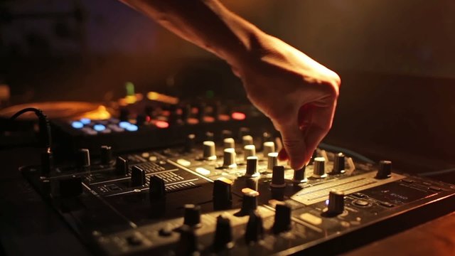 Dj mixing at the night club