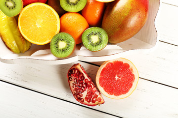 Assortment of fruits on wooden table