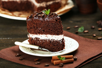 Delicious chocolate cake on table close-up