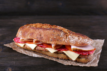 Fresh and tasty sandwich with ham and cheese