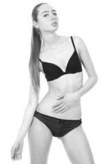 Fototapeta premium beautiful young girl in black lingerie