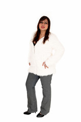 Woman in jacket and trousers.