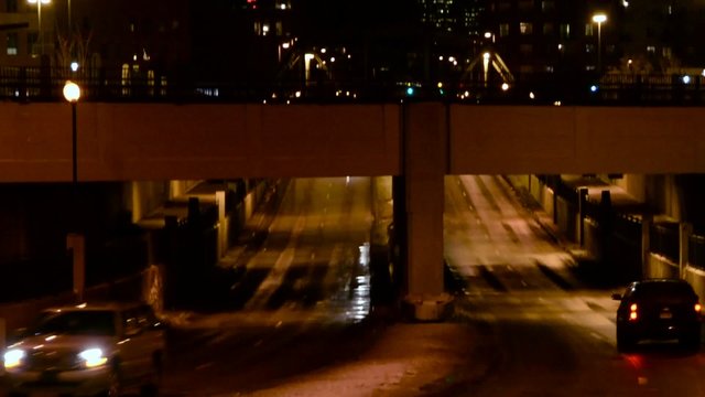 Traffic Going Under An Underpass In The City At Night