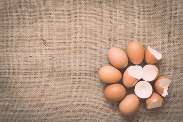 Eggs on old crumpled burlap