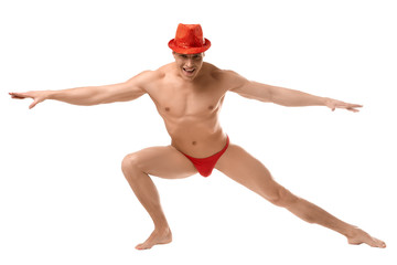 Smiling male performer of erotic dances