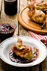 the baked quails with cowberry sauce