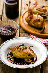 the baked quails with cowberry sauce