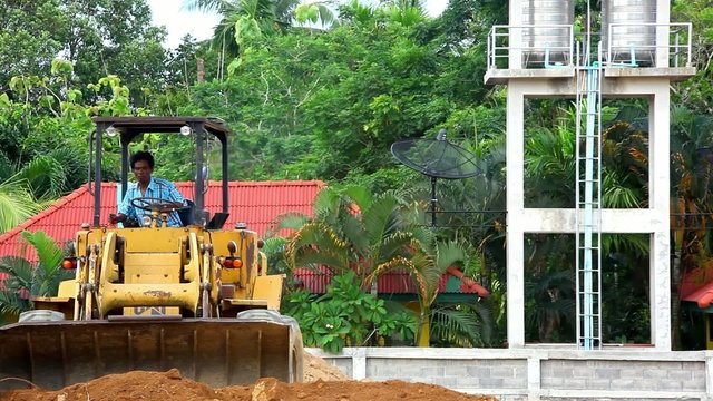 Earthmover dozer doing earthmoving works outdoors. Video