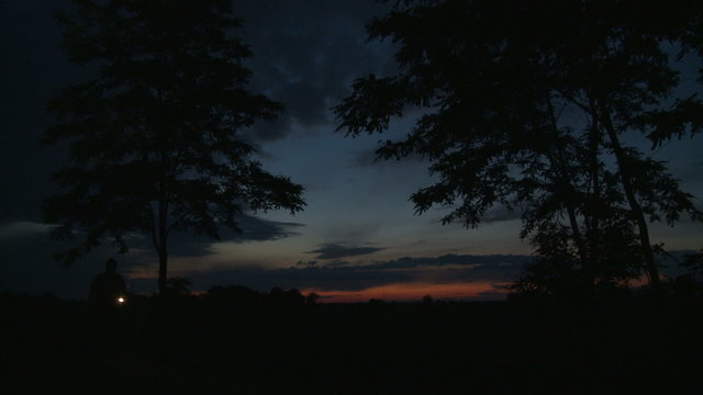 Walking at night, with flashlight in hand - HD 1080p footage