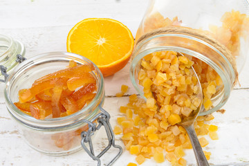 candied oranges cut into pieces - obrazy, fototapety, plakaty