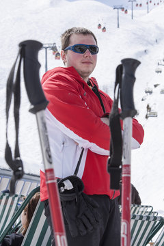 Sportsman taking a deep breath after skiing