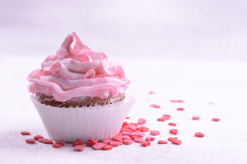 Delicious cupcake on table close-up