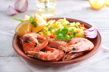 Seafood Paella on plate on table close-up