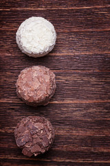 Milk chocolate,white chocolate and dark chocolate truffles on a