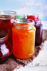 Fototapeta na wymiar Homemade jars of fruits jam