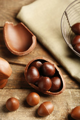 Chocolate Easter Eggs on wooden background