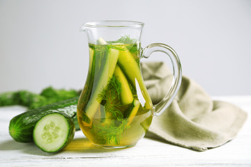 Glass ewer with fresh organic cucumber water