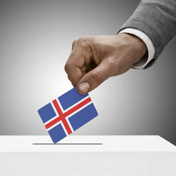 Black male holding flag. Voting concept - Iceland