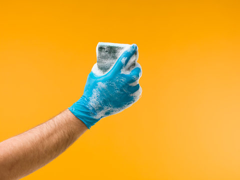 Hand Holding Sponge With Detergent