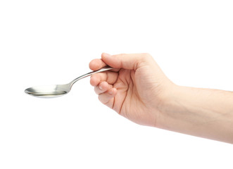 Male hand holding a spoon with oil