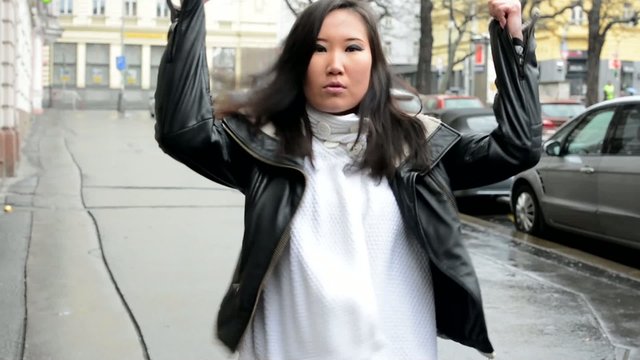 Young Attractive Asian Woman Dancing - Urban Street - City