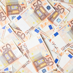 Multuple fifty euro bank notes