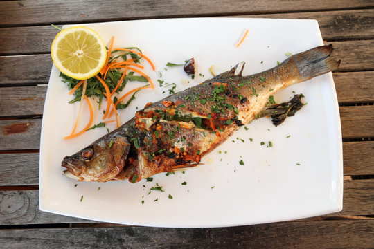 Grilled sea bass Fish plate,serving in maltese restaurant