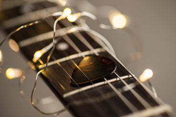 Guitar frets with mediator, strings and lights