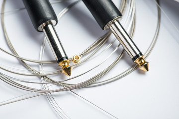 Guitar strings with cable and jacks