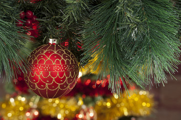 Obraz na płótnie Canvas Closeup of red Christmas balls on colored background