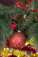 Fototapeta na wymiar Closeup of red Christmas balls on colored background