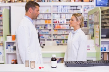 Fototapeta na wymiar Pharmacists talking each other
