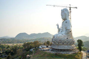 The Guan Yin goddess giant statue under twilight sky