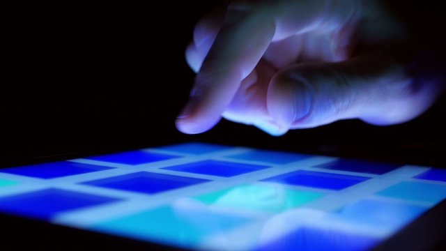 Colorful tablet computer touchscreen and swiping finger