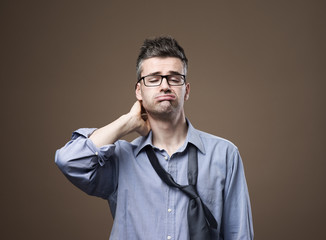 Confused untidy businessman