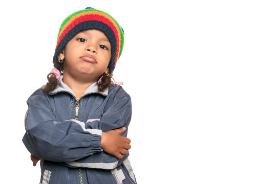 Little multiracial girl with a hip hop artist look