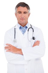 Fototapeta premium Serious doctor looking at camera