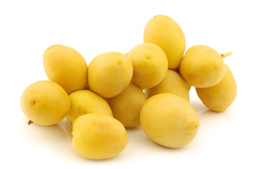  branch with dates (Phoenix dactylifera) on a white background