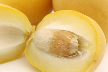 cut date (Phoenix dactylifera) on a white background