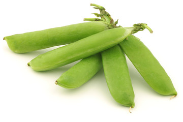 green pea pods  on a white background