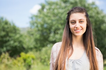 Pretty brunette smiling at camera