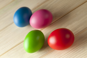 Easter eggs on wooden background